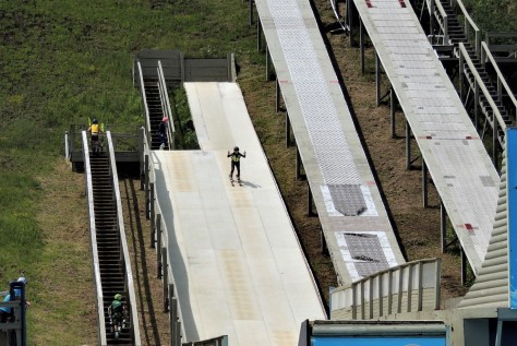 Freestyle skier coming down the ramp